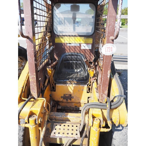 1724 - Case 1818 skid steer. C/w grab, bucket, tines, spike and drawbar