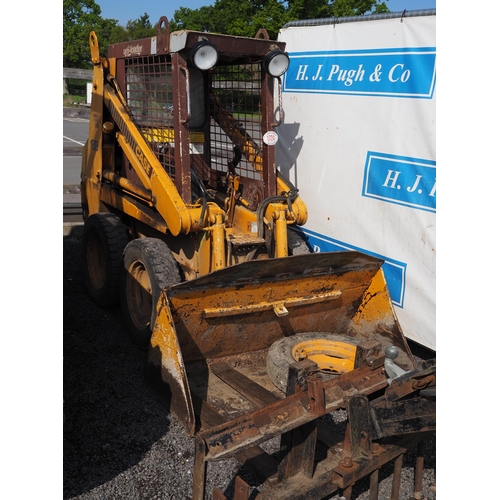 1724 - Case 1818 skid steer. C/w grab, bucket, tines, spike and drawbar