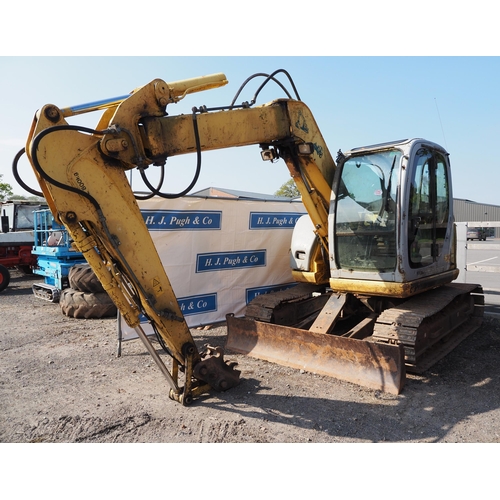 1725 - New Holland Kobelco E70SR digger, Working order, c/w 6 digging and ditching buckets. Key in office