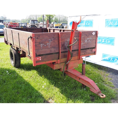 1729 - 2 Wheel 3 ton tipping trailer. New ram. Refurbished wooden sides laser engraved with animal scenes