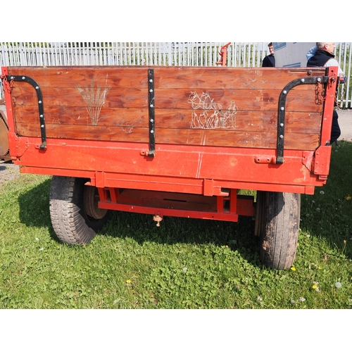 1729 - 2 Wheel 3 ton tipping trailer. New ram. Refurbished wooden sides laser engraved with animal scenes