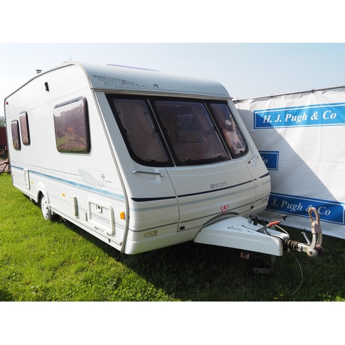 1739 - Swift 490SE lifestyle caravan with awning, motor mover, water carrier, etc.