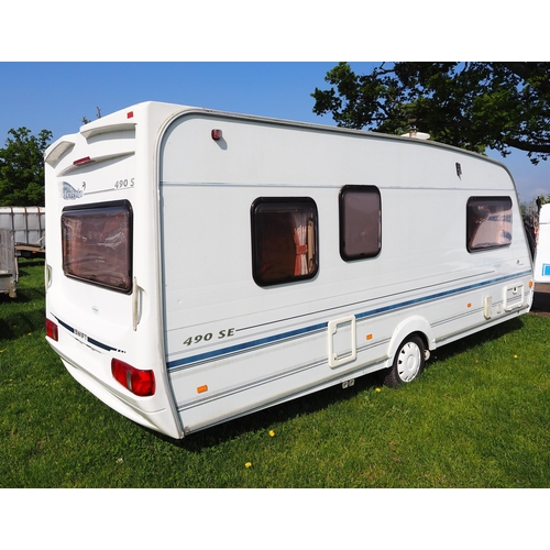 1739 - Swift 490SE lifestyle caravan with awning, motor mover, water carrier, etc.