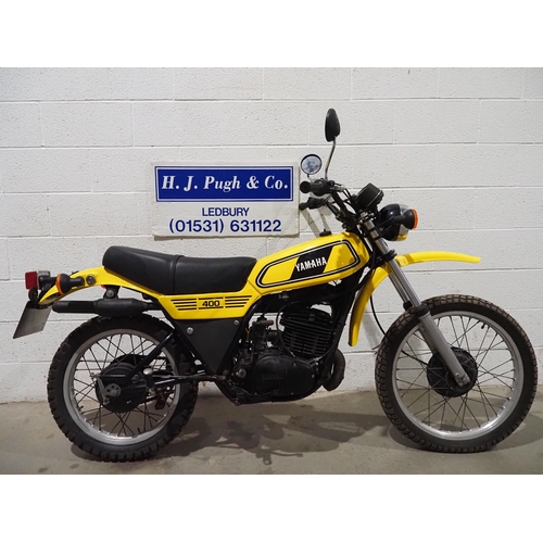 1034 - Yamaha DT400 trail motorcycle. 1977. 398cc
Runs and rides.
Reg. TJA 380R. Part of V5. Keys