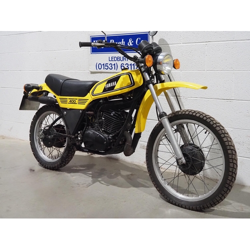 1034 - Yamaha DT400 trail motorcycle. 1977. 398cc
Runs and rides.
Reg. TJA 380R. Part of V5. Keys