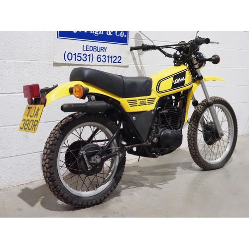 1034 - Yamaha DT400 trail motorcycle. 1977. 398cc
Runs and rides.
Reg. TJA 380R. Part of V5. Keys