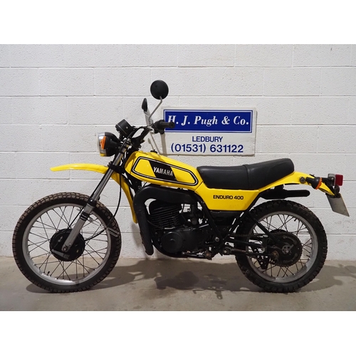 1034 - Yamaha DT400 trail motorcycle. 1977. 398cc
Runs and rides.
Reg. TJA 380R. Part of V5. Keys