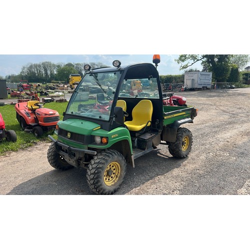 1665A - John Deere 850D gator XUV. 2010. Runs and drives. Showing 2700+ hours. Key in office