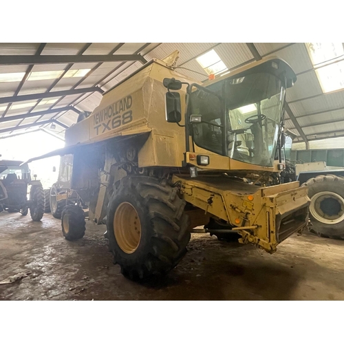 285 - New Holland TS68 Plus combine, with straw chopper, 4005 engine hours and 3358 drum hours, 24.ft head... 