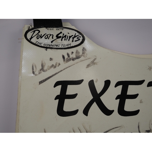 124 - An Exeter Falcons speedway race vest signed by Colin Hill, Mark Simmonds and others