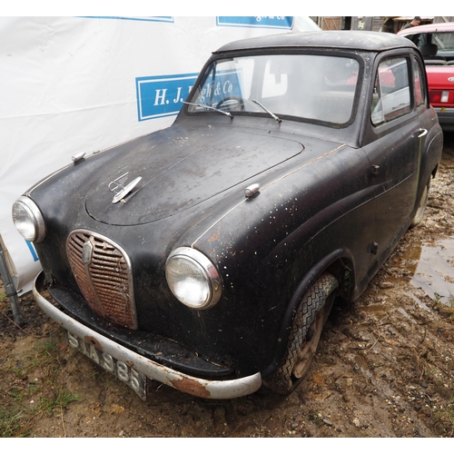 165 - Austin England car. 1955. 800cc. Petrol
In need of restoration. Showing 72,967 Miles. Reg STA 985