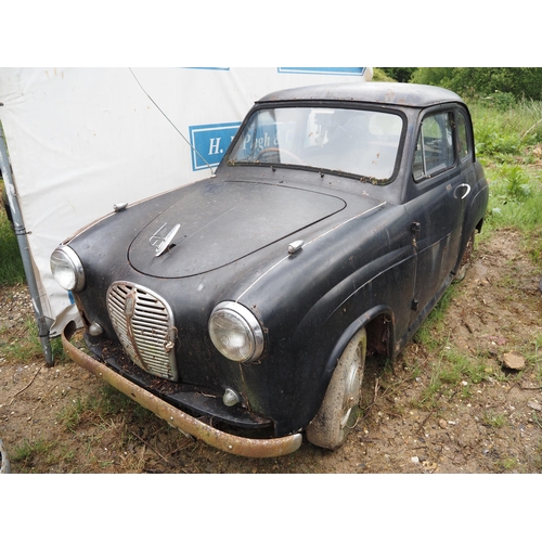 166 - Austin England car. 1955. 800cc. Petrol
In need of restoration. Showing 55,331 Miles. Reg TYC 994