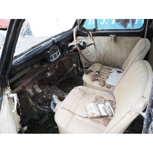 166 - Austin England car. 1955. 800cc. Petrol
In need of restoration. Showing 55,331 Miles. Reg TYC 994