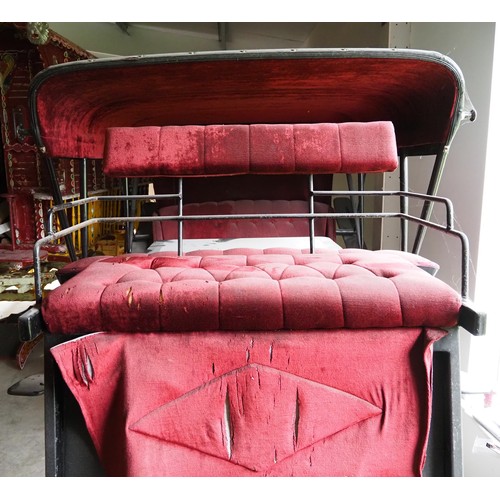 151 - Horse drawn 4 wheeled coach. Red upholstered seats and table