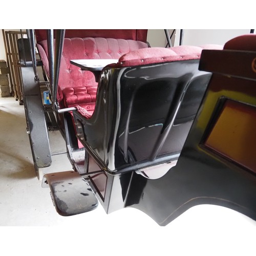 151 - Horse drawn 4 wheeled coach. Red upholstered seats and table