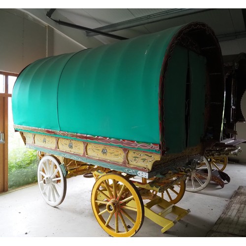 153 - Original bow top living wagon. Furnished with bed and other items. Fitted with new canvas