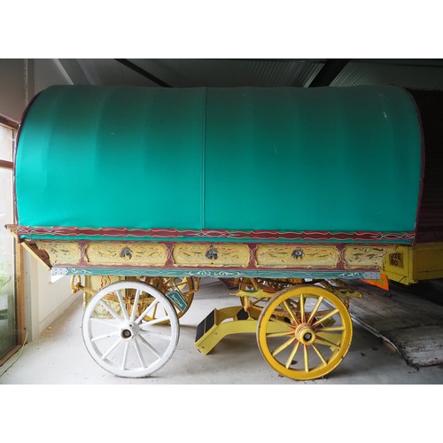 153 - Original bow top living wagon. Furnished with bed and other items. Fitted with new canvas