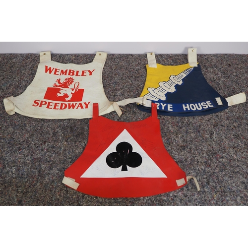 348 - 3 Plastic speedway race vests - the Wembley Lions, the Rye House Rockets and the Belle Vue Aces