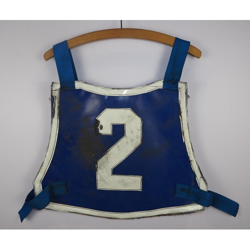 312 - A Hackney Hawks speedway race vest labelled Keith White. Possibly replica