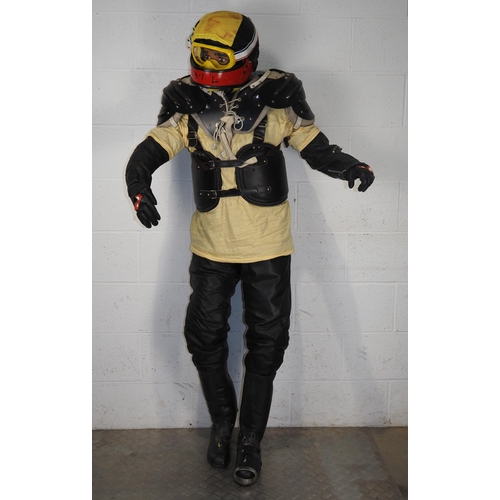 373 - Mannequin dressed in speedway race leathers, boots, helmet, gloves and goggles