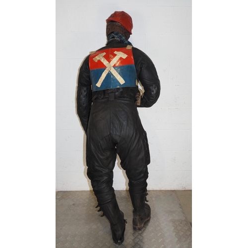 374 - Mannequin dressed in vintage speedway race leathers, boots, helmet, goggles and Westham Hammers race... 