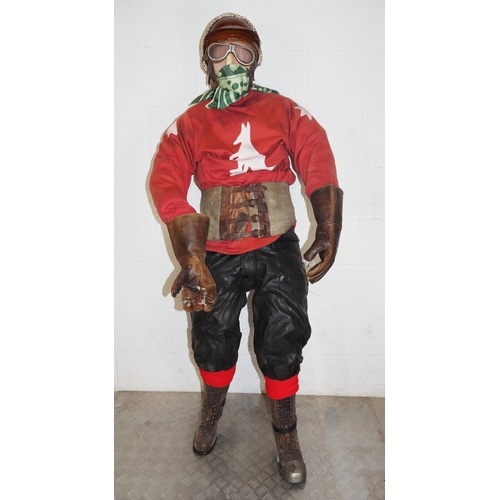 375 - Mannequin dressed in vintage speedway race leathers, boots, gloves, helmet, goggles and Australian j... 