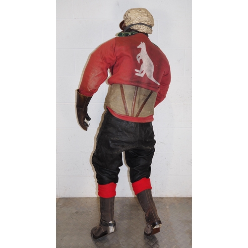 375 - Mannequin dressed in vintage speedway race leathers, boots, gloves, helmet, goggles and Australian j... 