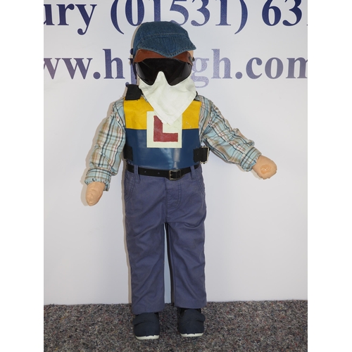 383 - Child mannequin dressed in learner speedway outfit with 3 badges