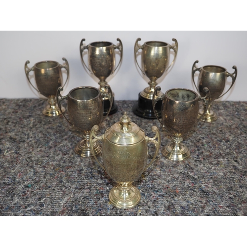 446 - 7 Hallmarked silver replicas of the Evening Chronicle Dirt Track Challenge Cup