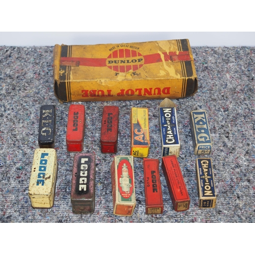 505 - Assorted spark plug boxes and tins to include KLG