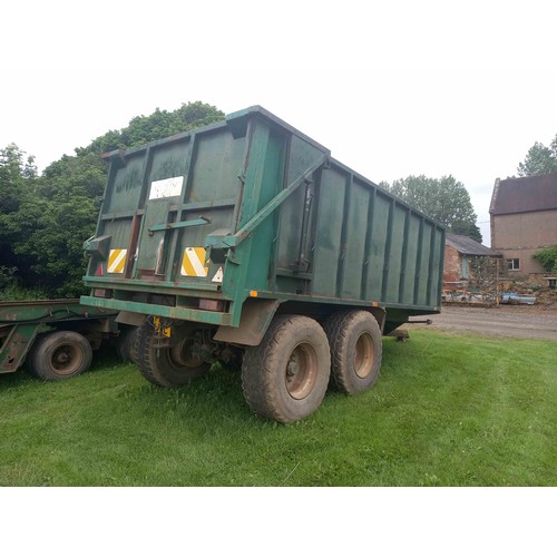 279 - Merrick Loggin 18 ton tandem axle grain trailer. Hydraulic tail gate, air brakes and side extensions