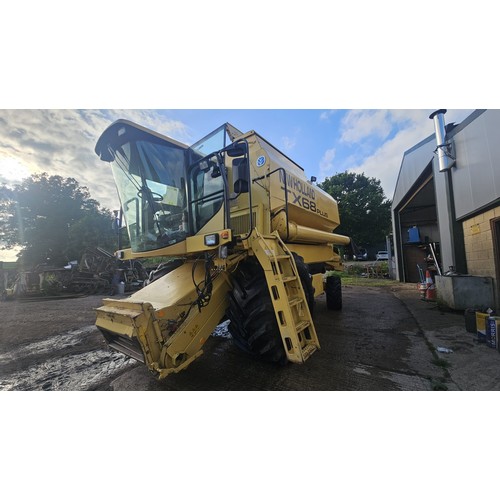 285 - New Holland TS68 Plus combine, with straw chopper, 4005 engine hours and 3358 drum hours, 24.ft head... 