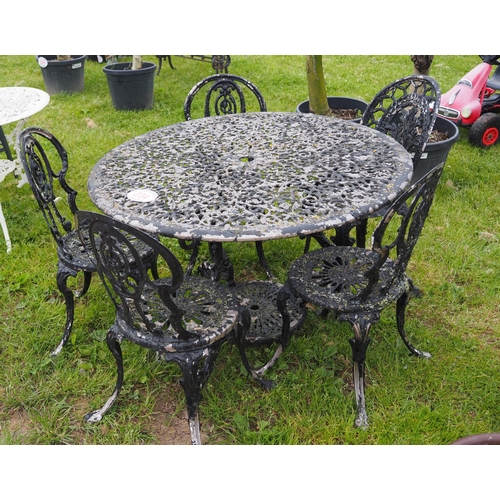 234 - Round garden table and 5 chairs