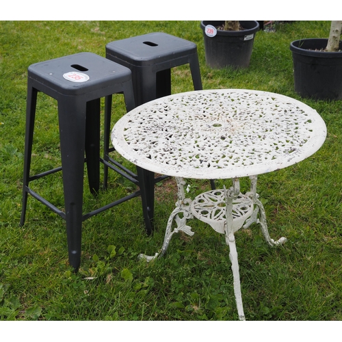 235 - Round garden table and 2 stools