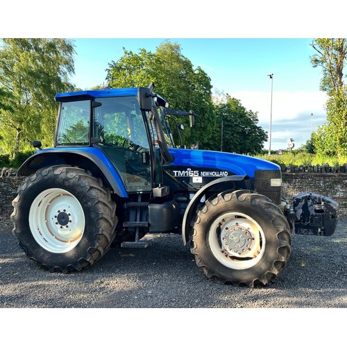 1557 - New Holland TM165 tractor. Runs and drives. 8987 hours showing. Cab suspension. Full set of front we... 