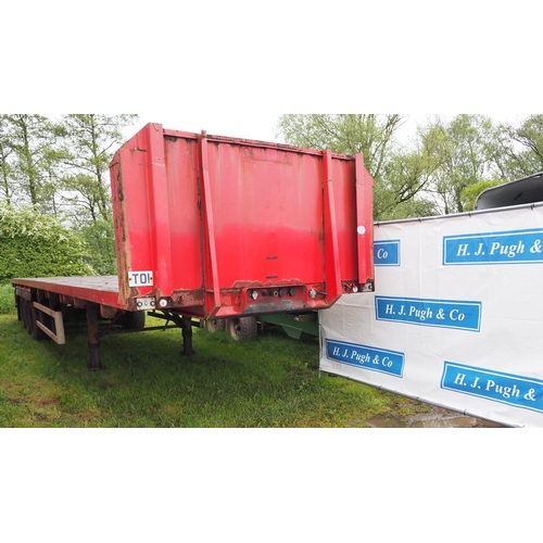 1567A - Articulated tri axle flatbed trailer