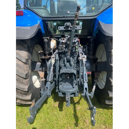 1557 - New Holland TM165 tractor. Runs and drives. 8987 hours showing. Cab suspension. Full set of front we... 