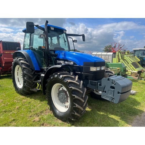 New Holland TM165 tractor. Runs and drives. 8987 hours showing. Cab suspension. Full set of front weights. Reg. X787 ACJ. Key in office.