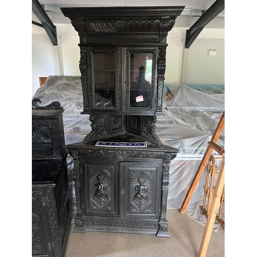 128 - Heavily carved corner unit with glazed top doors 83 x 41