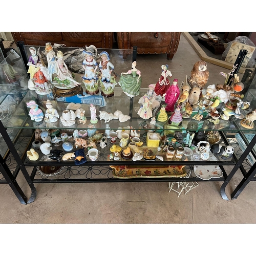 75 - Glass display cabinet and contents to include Royal Doulton figures