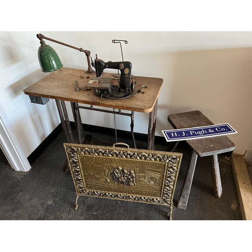 84 - Heavy duty sewing machine table, wooden stool and brass fire guard