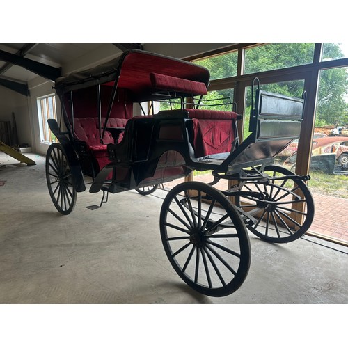 151 - Horse drawn 4 wheeled coach. Red upholstered seats and table