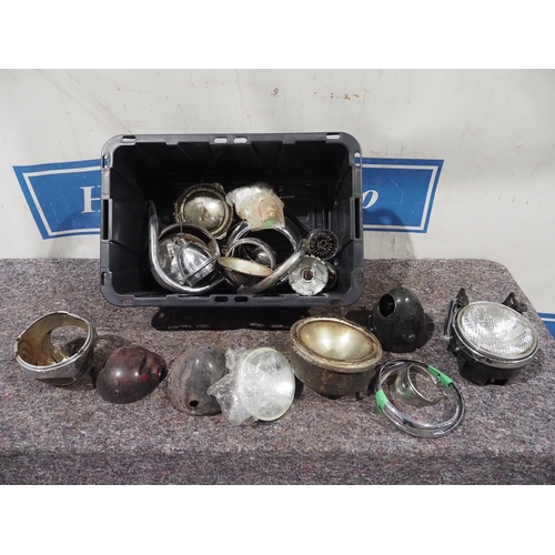 74 - Assorted headlamp shells and chrome surrounds