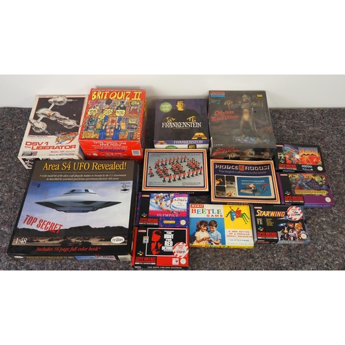 26 - Quantity of games and model kits to include Brit Quiz II, Frankenstein and Super Nintendo video game... 