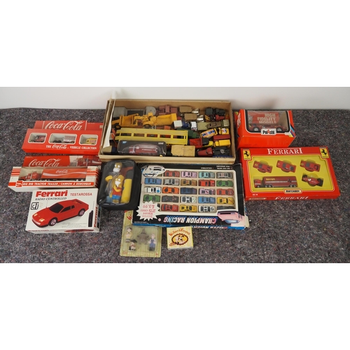 42 - Coca-Cola boxed model vehicles, model Ferraris and other assorted model vehicles