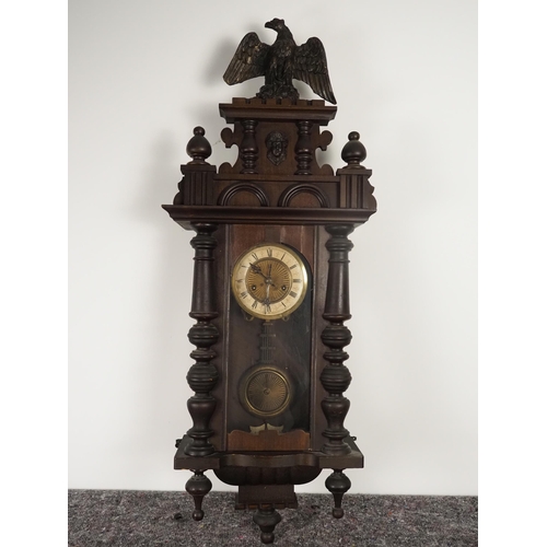 364 - Mahogany cased wall clock with carved eagle to the top 39