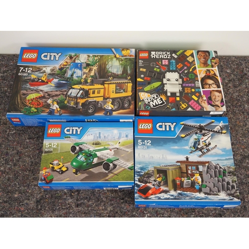 70 - Lego City and Brick Headz sets in box to include 60101, 60131, 60160 and 41597