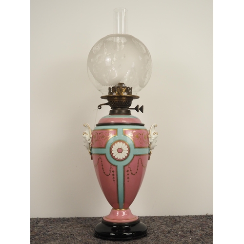 277 - Ceramic and brass oil lamp complete with globe and chimney 25