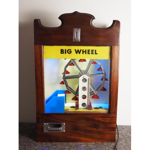 286 - Big Wheel coin drop machine in mahogany case. In working order