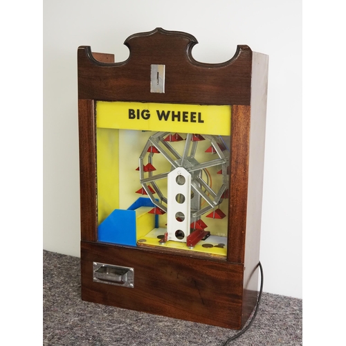 286 - Big Wheel coin drop machine in mahogany case. In working order